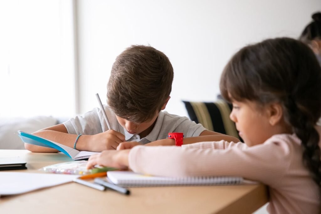 children studying at a table in a classroom.
best teacher training institute Borivali, Mumbai.